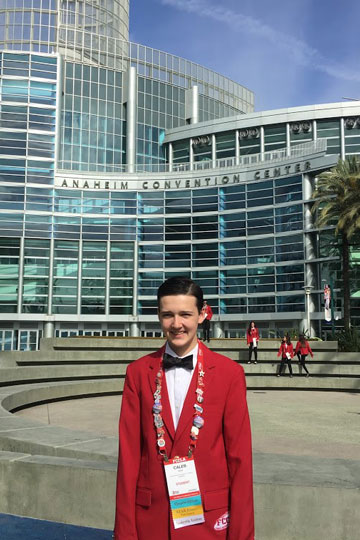 Student standing outside Anaheim Convention Center