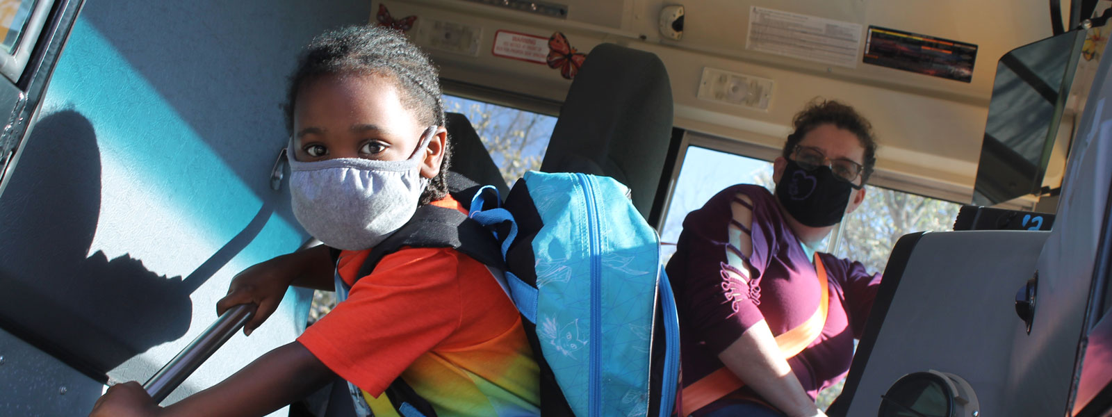 PreK student leaving bus