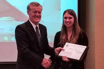 irsten Filiberto receiving Air Force Association Teacher of the Year award