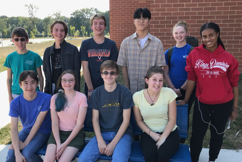 Orchestra students standing outside