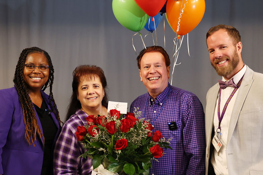 Teacher of the Year Albert Carter with Superintendent Edwards, Principal Rule and wife Lori