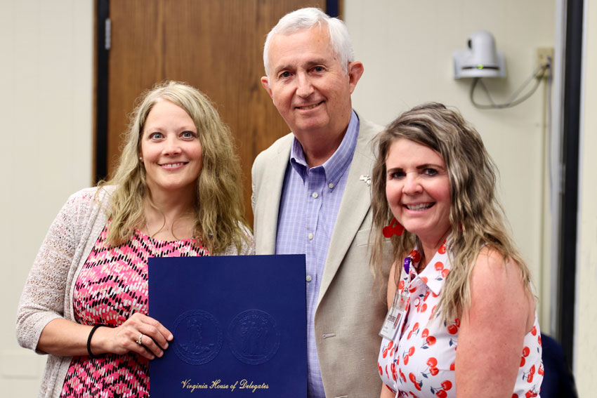 Wendell Walker with Dr. Baldwin & Ms. Wills holding official House of Delegates Resolution