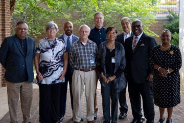 School Board members standing outside