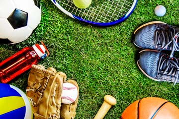 Various sports equipment on field