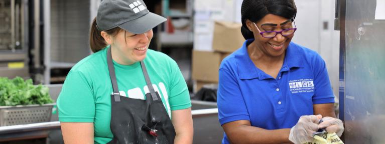 Brigaid chef with LCS school nutrition worker